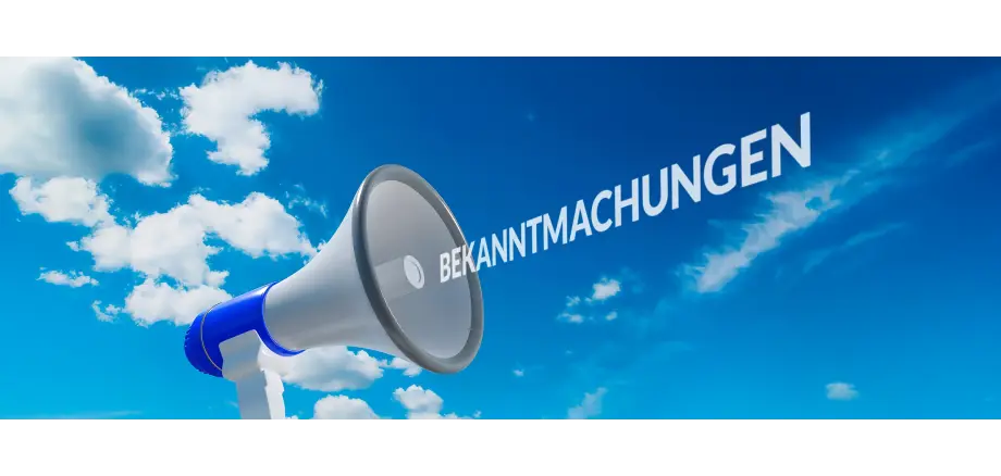 Auf dem Bild ist ein Megaphone mit der Schrift "Bekanntmachung" zu sehen